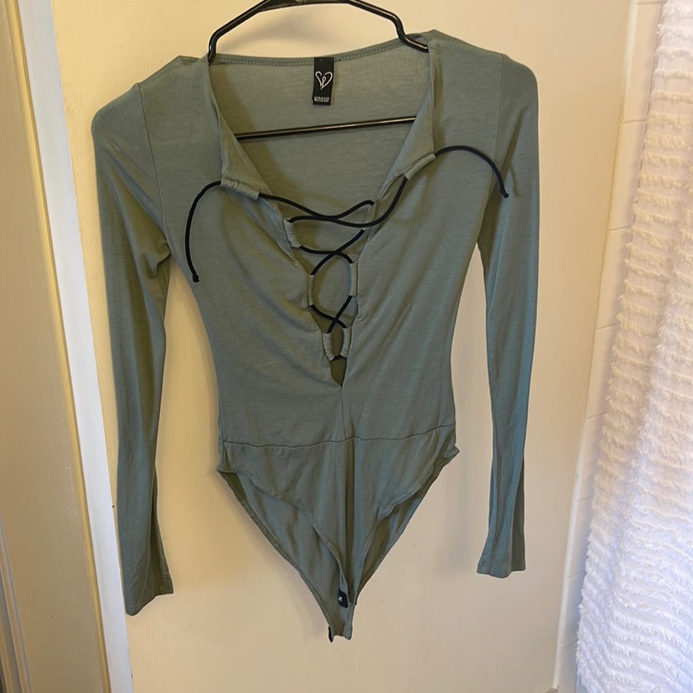 Green lace up bodysuit.